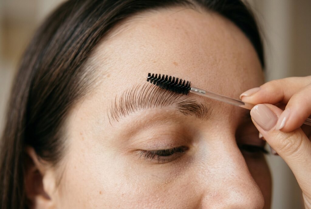 Fine pencil drawing short hair-like strokes into a natural eyebrow