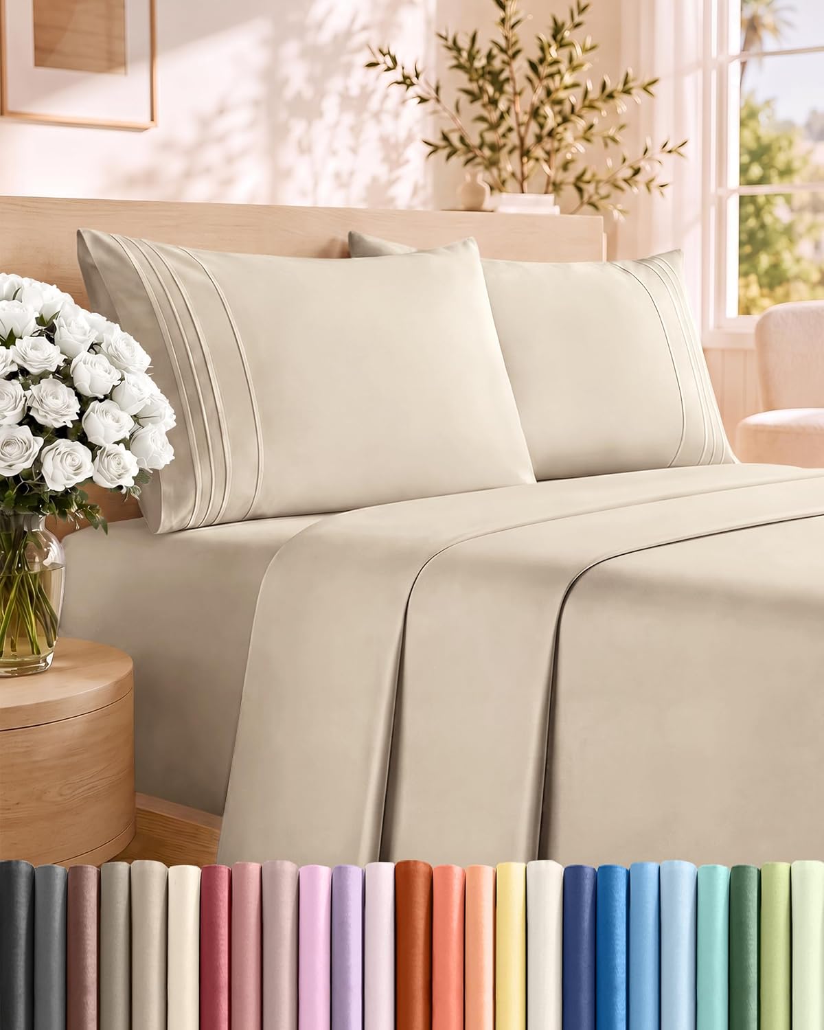 Queen size sheet set in a soft color on a made bed with matching pillowcases